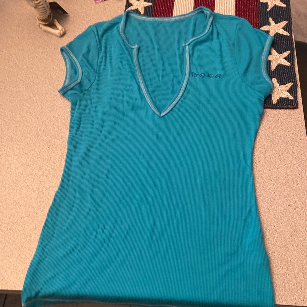 Bebe top Bebe top  one little stain